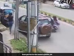 Video: Woman Rider Run Over After Being Hit By Door Of Parked Car Video: Woman Rider Run Over After Being Hit By Door Of Parked Car