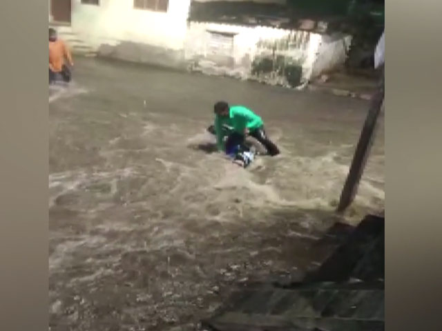 Video: Biker Being Washed Away In Floodwater, Rescued In Hyderabad