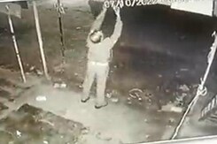 UP Cop Caught On Camera Stealing Light Bulb From Roadside Shop UP Cop Caught On Camera Stealing Light Bulb From Roadside Shop