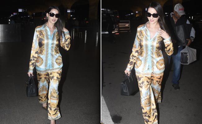 Nora Fatehi In A Fendi Shirt And Trousers Set Is Making Airport Glam A Thing