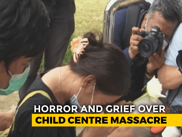 Day After Mass Shooting, Weeping Families Gather Outside Thai Nursery