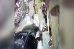 CCTV Shows Car Running Over People After Fight With Biker In Delhi CCTV Shows Car Running Over People After Fight With Biker In Delhi