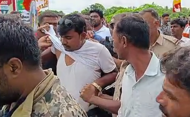 Watch: Karnataka Cops Beat Congress Worker, Take Off His 'PayCM' T-Shirt
