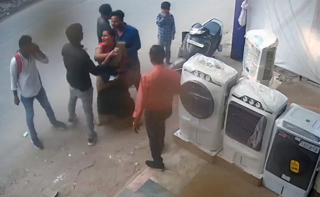 Watch: Woman Pushes Staff At UP Store, Accomplice Tries To Steal Laptop