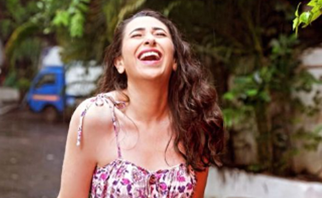 Nothing, Just Karisma Kapoor Enjoying The "October Rain"