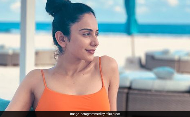 Rakul Preet Singh Gives Maldives Beach Fashion A Zesty Touch In A Peppy Orange Swimsuit