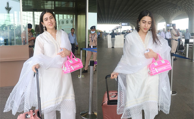 Sara Ali Khan's White <i>Salwar Suit</i> Gets A Fluorescent Pop Of Colour With Her Rs 3.4 Lakh Handbag