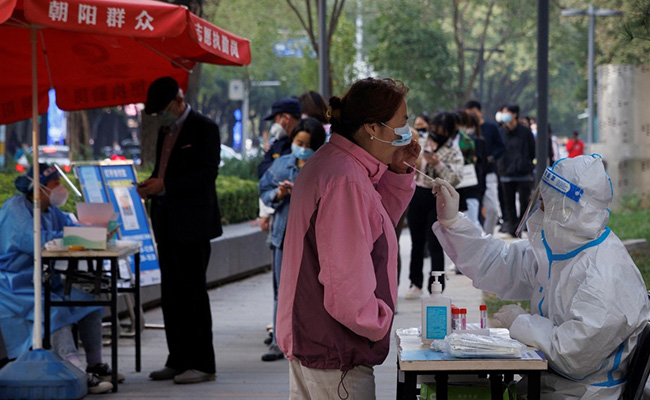 China Eases Covid Restrictions, Cuts Quarantine Period For Travellers