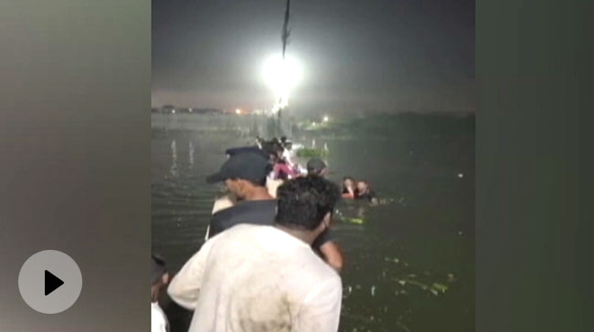 Gujarat Bridge Collapse | Video: People Swim To Safety After Gujarat Cable Bridge Snaps - Vimarsana News