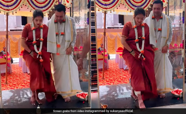 दुल्हन ने गृह प्रवेश के दौरान इतनी ज़ोर से मारी लात, कि हवा में उछल गया चावल से भरा ग्लास, Video देख नहीं रुकेगी हंसी