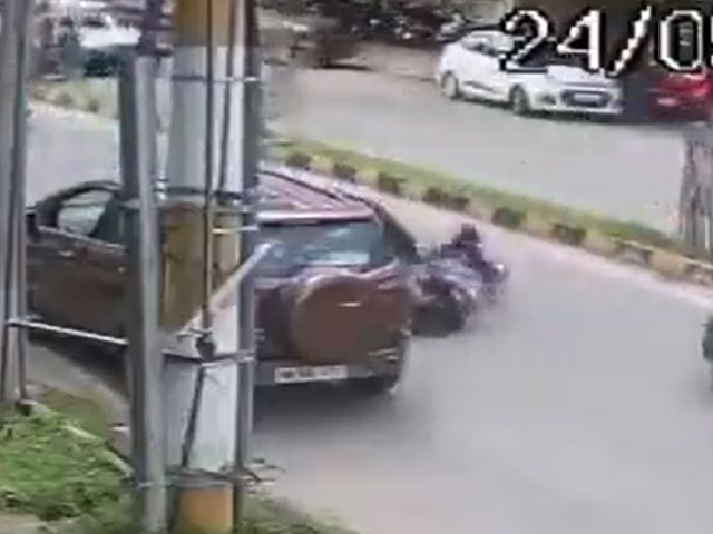 Video: Woman Rider Run Over After Being Hit By Door Of Parked Car