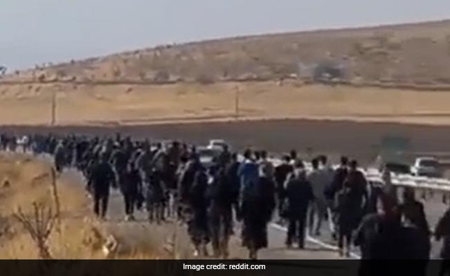 Video Shows Iran Mourners Heading To Mahsa Amini's Grave Despite Crackdown