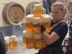 Viral Video: Waitress Picks And Carries Over 12 Beer Mugs At Once; Internet Reacts Viral Video: Waitress Picks And Carries Over 12 Beer Mugs At Once; Internet Reacts