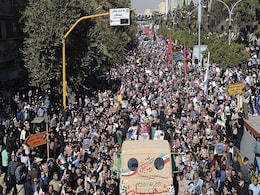 Iran Protesters Chant Against Riots While Mourning Shrine Attack Victims Iran Protesters Chant Against Riots While Mourning Shrine Attack Victims