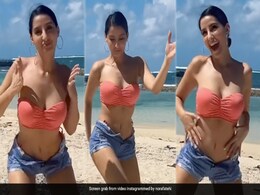 Nora Fatehi's Dance Moves Only Get Stylishly Better By The Beach In A Pink Swim Set, Denim Shorts Nora Fatehi's Dance Moves Only Get Stylishly Better By The Beach In A Pink Swim Set, Denim Shorts