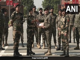 India, Pakistan Soldiers Exchange Sweets At Attari-Wagah Border On Diwali India, Pakistan Soldiers Exchange Sweets At Attari-Wagah Border On Diwali