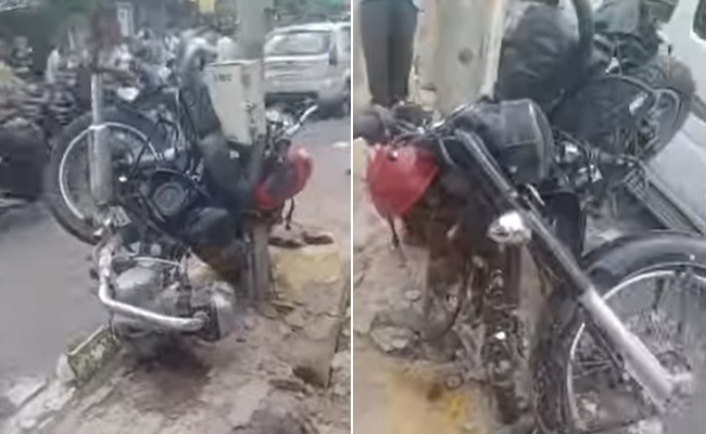 एक्सिडेंट के बाद पोल पर सांप की तरह लिपट गई Bullet, यकीन ना हो तो देखें लें VIDEO