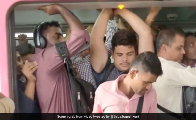 Old Video Of Man Squeezing Himself To Get Inside Packed Mumbai Metro Train Goes Viral