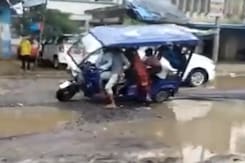 Watch: E-Rickshaw Overturned On Potholed Road, Officials Didn’t Stop Watch: E-Rickshaw Overturned On Potholed Road, Officials Didn’t Stop