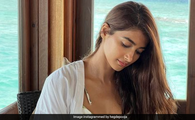 Pooja Hegde's Beach Throwback In A Chic Printed Bralette With A White Shirt Almost Made Us Forget It's Autumn