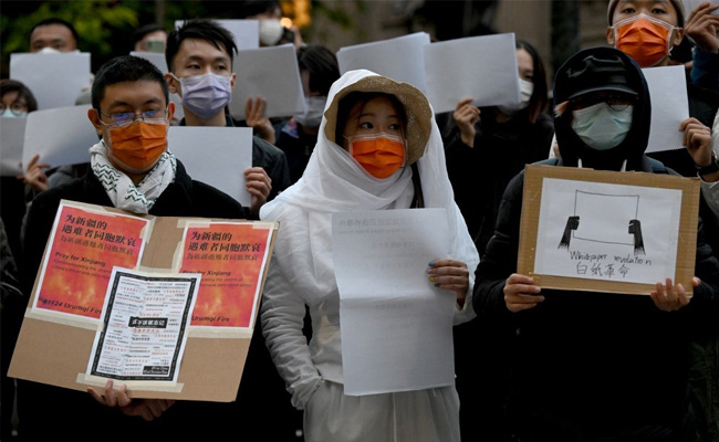 Blank Paper New Symbol Of Defiance In China's Covid Protests. Here's Why