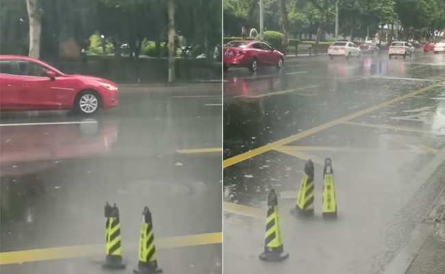 बारिश में तेज हवा के झोंको के बीच ताल से ताल मिलाते थिरकते नजर आए ट्रैफिक कोन्स! देखें VIDEO