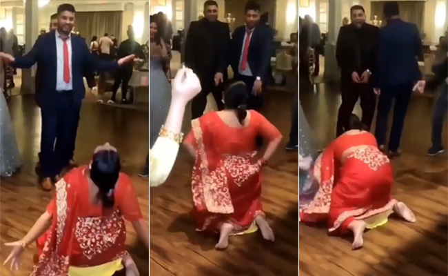 VIDEO: डांस फ्लोर पर लाल साड़ी वाली 'आंटी' ने कर दिया ऐसा अजीबोगरीब डांस मूव्स, शर्म से पानी पानी हो गए मेहमान