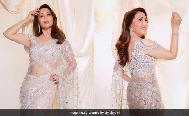 Redefining Elegance And Poise In An Embellished Sheer <i>Saree</i> Is Madhuri Dixit