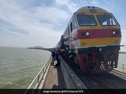This Country's 'Floating Train' Is A Big Hit As Dam Waters Rise This Country's 'Floating Train' Is A Big Hit As Dam Waters Rise