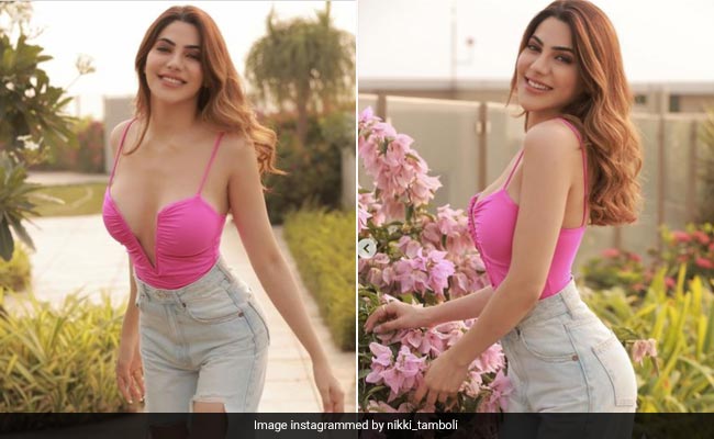 Yes Nikki Tamboli, "Smiles Are Always In Fashion" And So Are Ripped Jeans With A Bright Pink Corset Tops