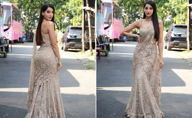 Nora Fatehi Is An Ethnic Dream Come Alive In A Beige Floral <i>Saree</i>