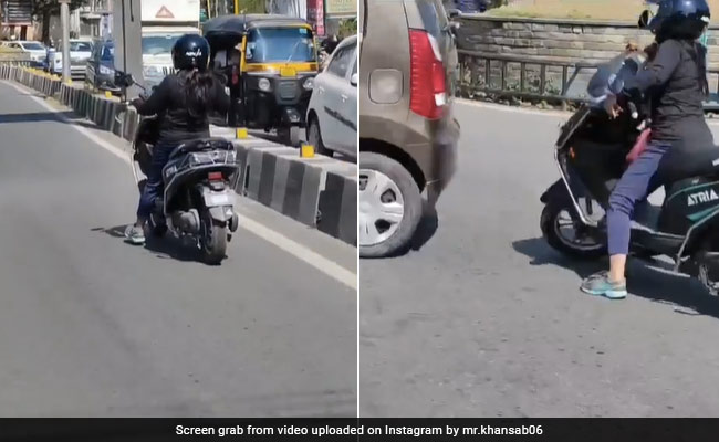 स्कूटी में ब्रेक लगाने के लिए पापा की परी ने किया गजब कारनामा, कार सामने आते ही की ऐसी हरकत, लोग बोले- दीदी Rocks !