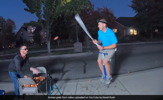 Man Sets Guinness World Record By Chopping Apples While Bouncing On Pogo Stick