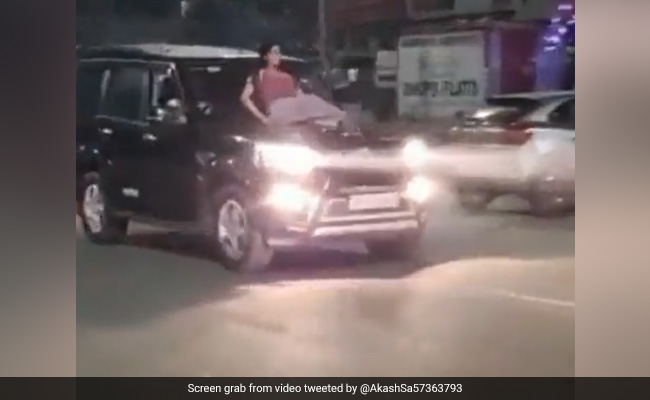 Watch: Noida Woman Performs Stunt By Sitting On Moving Car's Bonnet, UP Police Takes Action