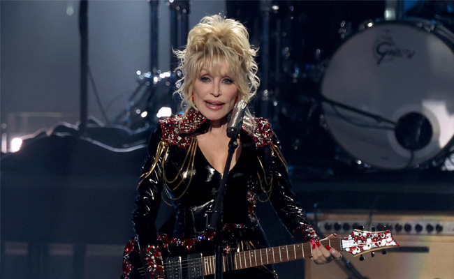 Jeff Bezos Gives Singer Dolly Parton $100 Million Award. This Is Why
