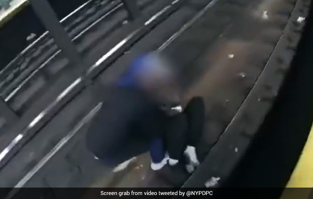 On Camera, US Police Officers Pull Man Off Subway Tracks Seconds Before Train Approaches