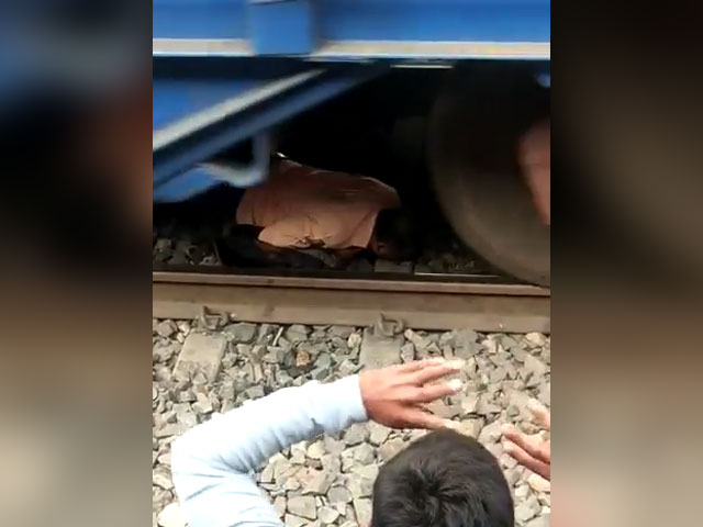 Man Tries To Cross Track From Under Parked Train. Then This Happens