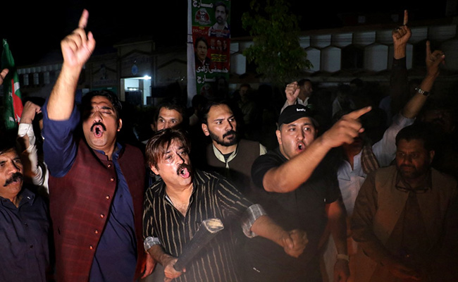 इमरान पर हमले के बाद पाकिस्तान में पहली बार टॉप ISI जनरल के खिलाफ प्रदर्शन, PTI ने कहा- यह एक चेतावनी