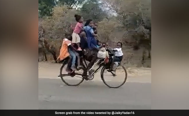 Viral Video Of Man Riding Bicycle With Nine Children Divides The Internet