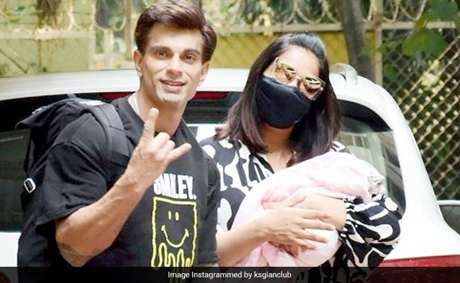 Bipasha Basu And Karan Singh Grover Bring Daughter Devi Home