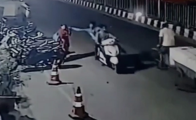 On Camera, 2 Men Sneak Up From Behind, Snatch Mobile From Woman In Delhi