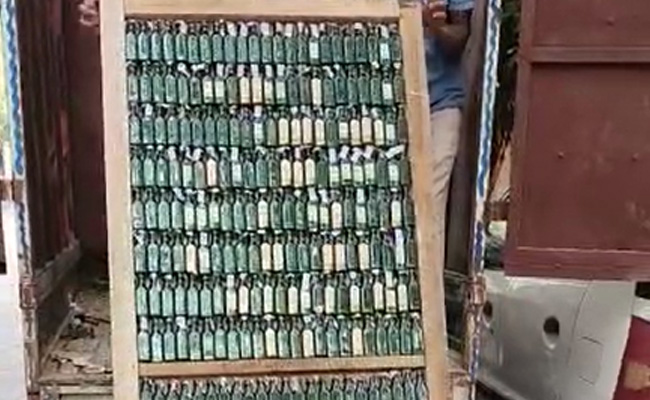 Video: Over 2,000 Liquor Bottles Were Being Smuggled, Hidden Inside Doors