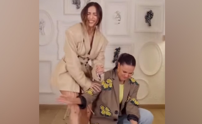 Malaika Arora Dances To <i>Tip Tip Barsa Pani</i> With Moral Support From Neha Dhupia