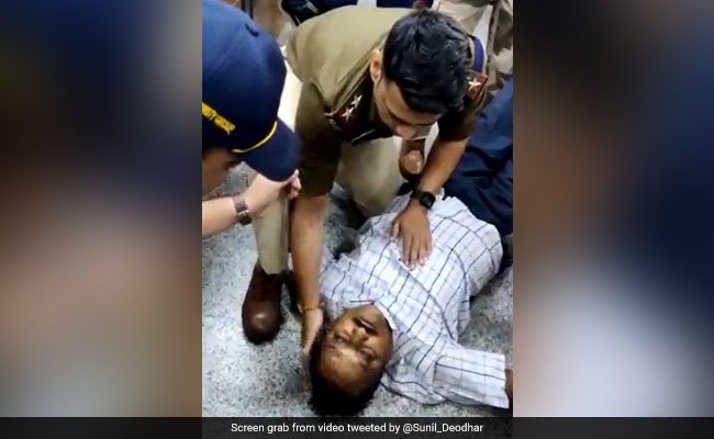 Watch: Paramilitary Personnel's Swift Action Saves Man Who Fell Unconscious At Ahmedabad Airport