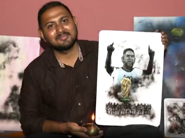 Artist Makes Smoke Portrait Of Lionel Messi With FIFA World Cup