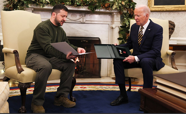 Zelensky Gives Biden Ukrainian Military Medal During White House Meeting