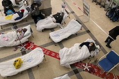 Massive Surge But China Downgrades Covid Curbs Massive Surge But China Downgrades Covid Curbs