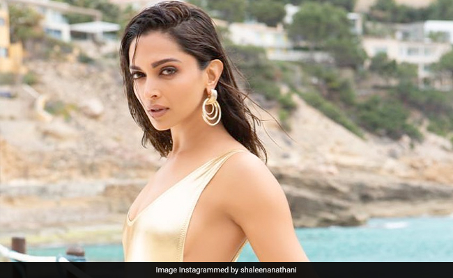 Deepika Padukone Creates 24K Magic In Her Golden Monokini For <i>Besharam Rang</i>