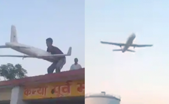 आसमान से गिरते प्लेन को छत पर खड़े लड़के ने झपट्टा मारकर पकड़ा, आंखों को धोखा दे रहा है VIDEO