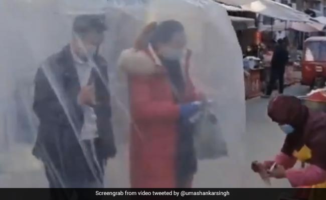 Viral Video: Chinese Couple Devises A Hack While Shopping Amid COVID-19 Surge